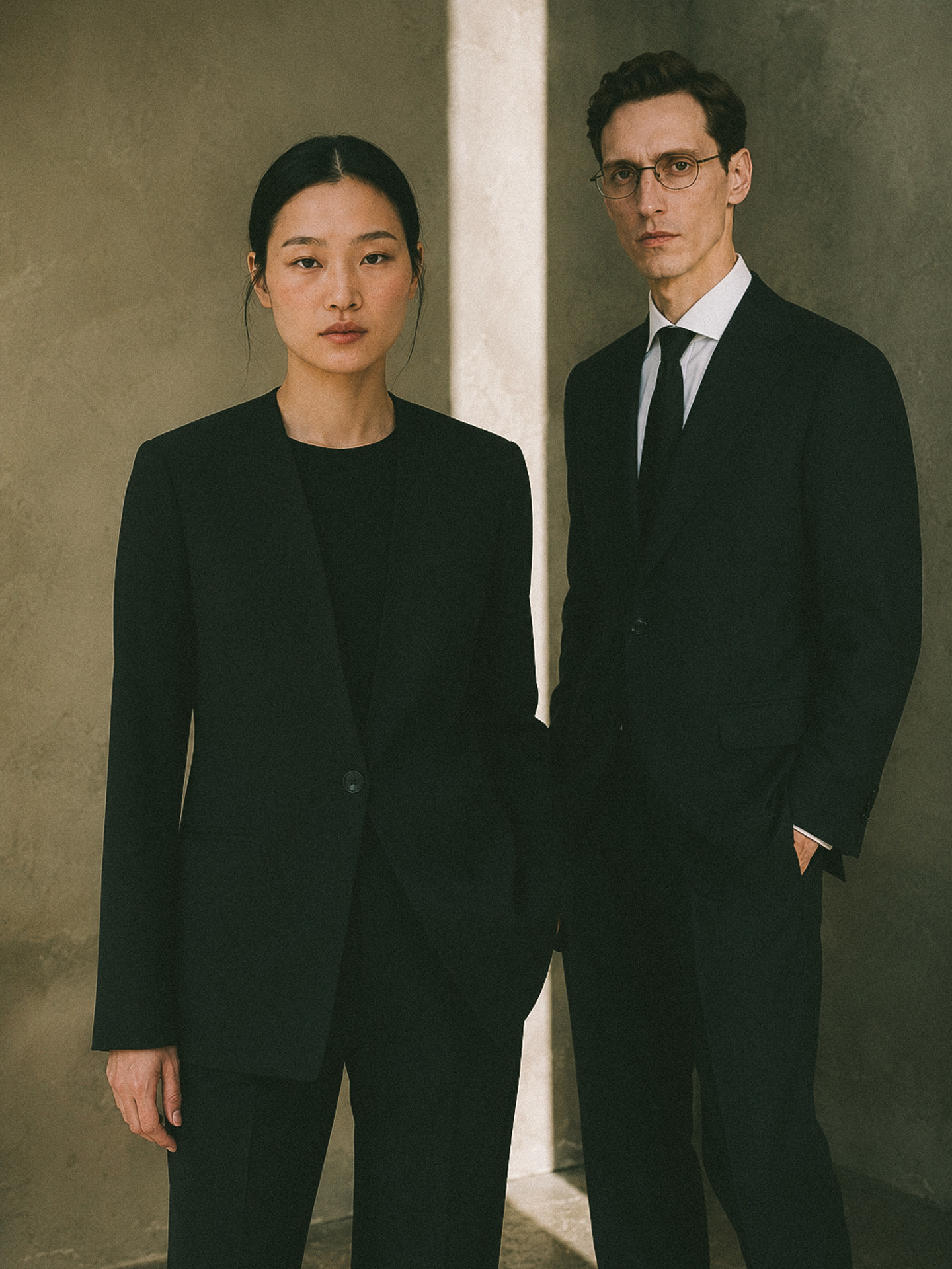Womenswear and menswear uniform looks side by side