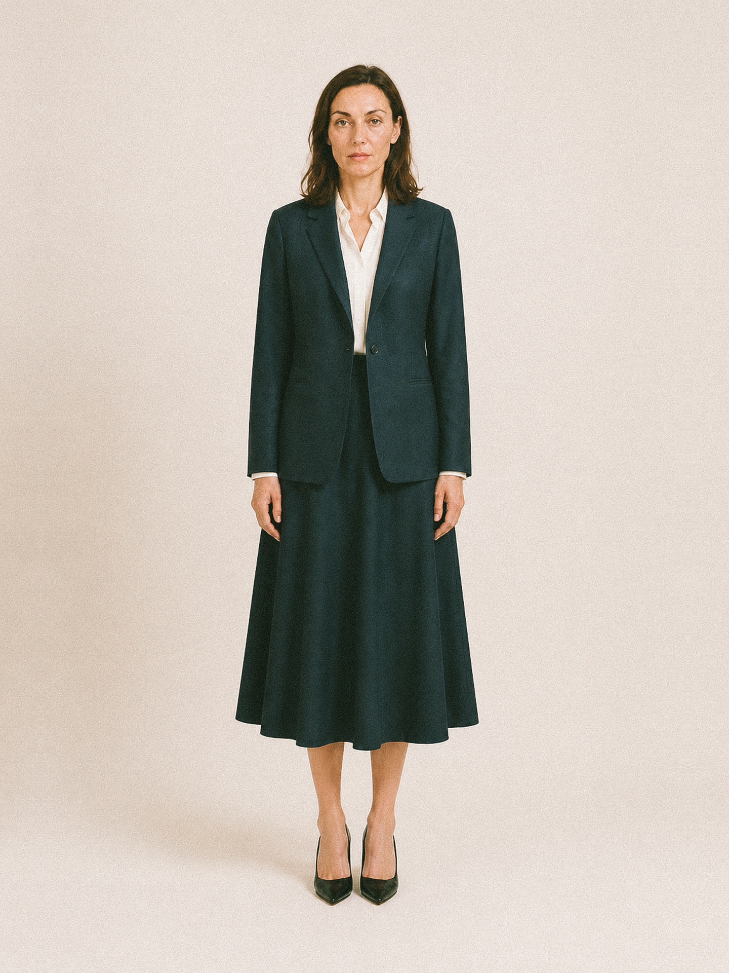 Womenswear uniform — navy jacket with a midi skirt